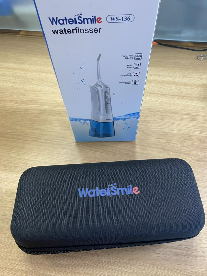 Máy tăm nước cầm tay WaterSmile WS-136 - Thiết kế nhỏ gọn, 4 chế độ làm sạch, 6 đầu tăm đa năng, sạc pin tiện lợi, hỗ trợ chăm sóc răng miệng hiệu quả