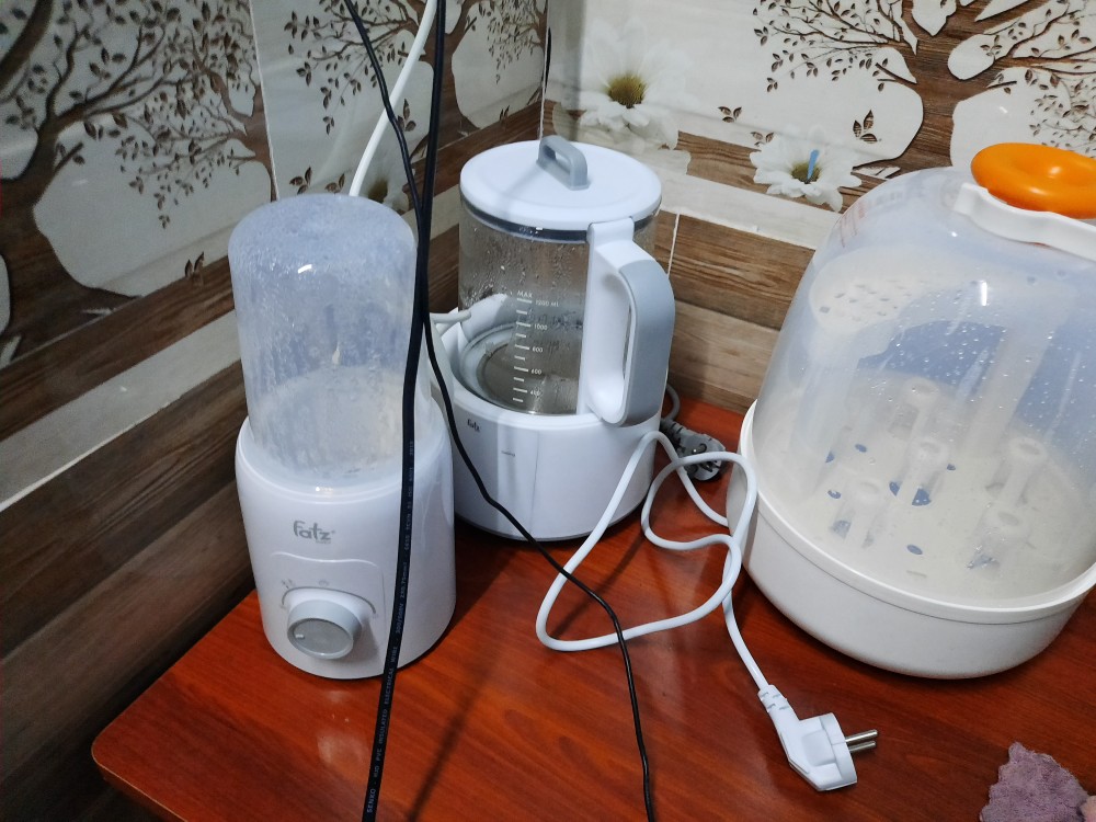 Máy hâm sữa và tiệt trùng Fatzbaby Mono 6 FB3001TN - 4 chức năng, tiết kiệm điện, thiết kế thông minh, phù hợp với mọi loại bình sữa.