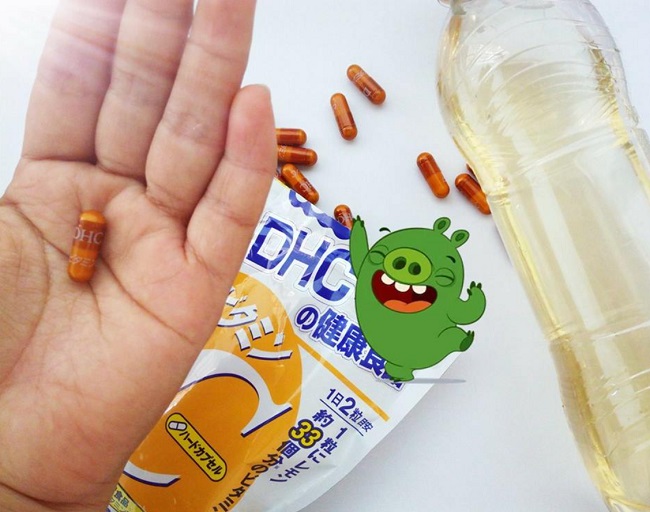 Uống vitamin C DHC trong hoặc sau bữa ăn