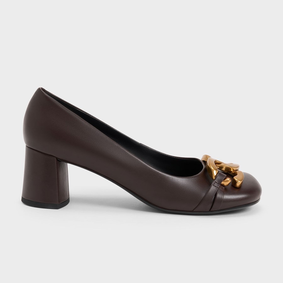 Camel leather pointy toe pumps . PURA LOPEZ
